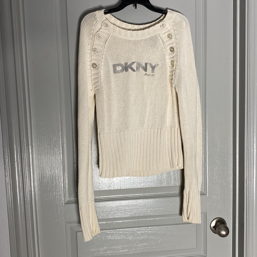 Sweater is size L but fits like an M